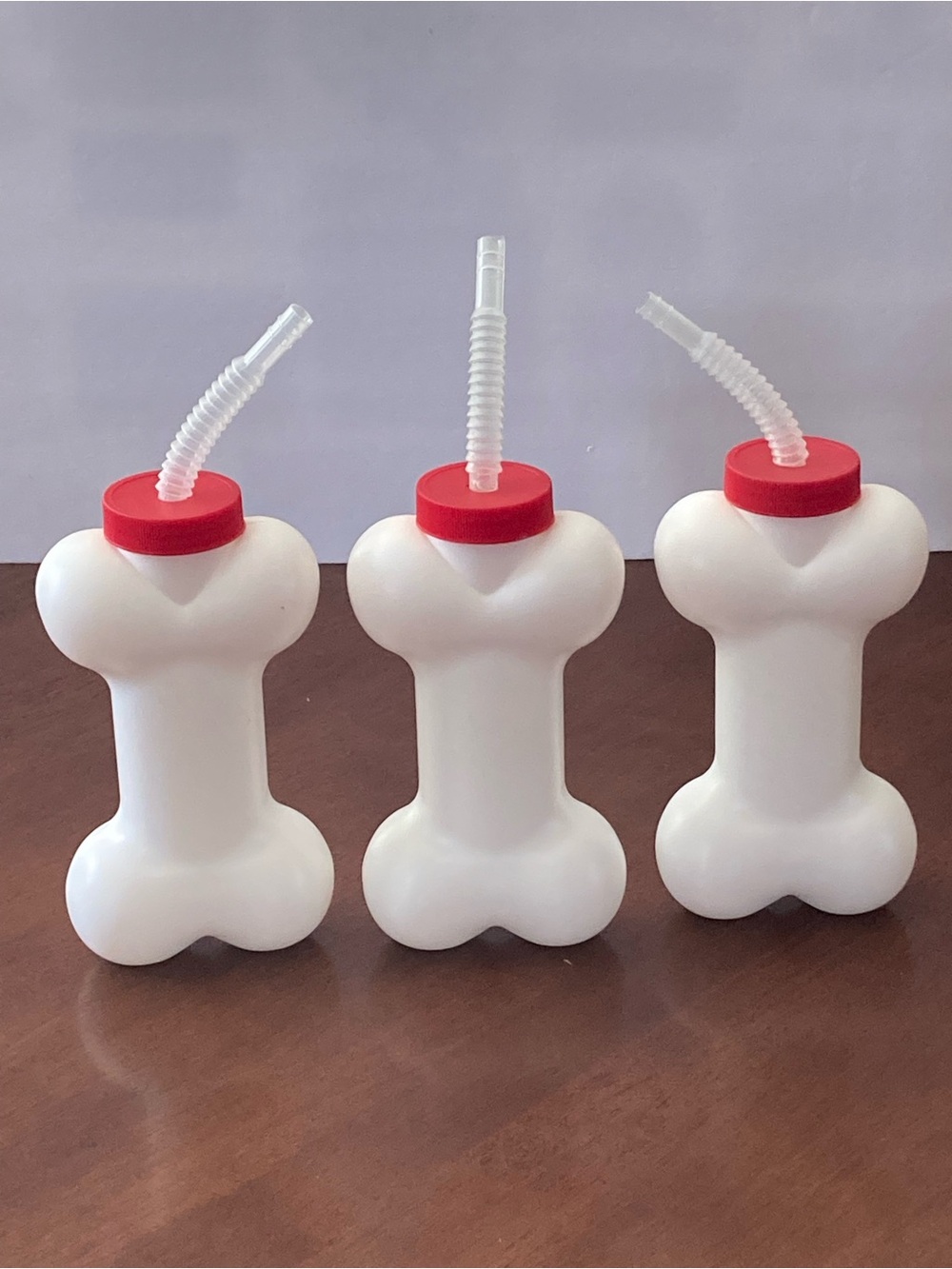 NWOT Bone-Shaped Party Drink Bottles with Red Caps and Clear Straws